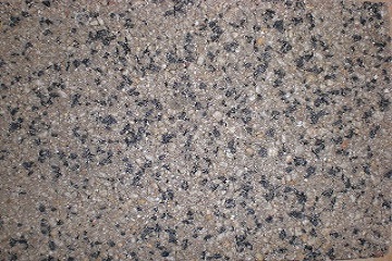 Colored asphalt, glass sand mixture in gray tones